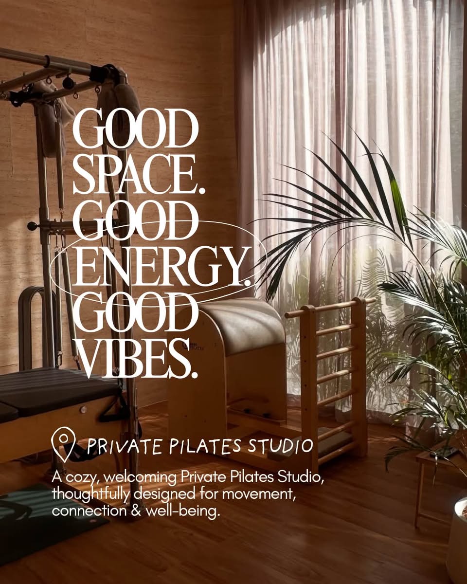 Inside the studio: a Cadillac, a ladder barrel and plants by the window